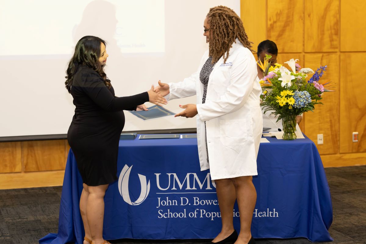 Student accepting an award at the 2023 Honors and Awards Ceremony